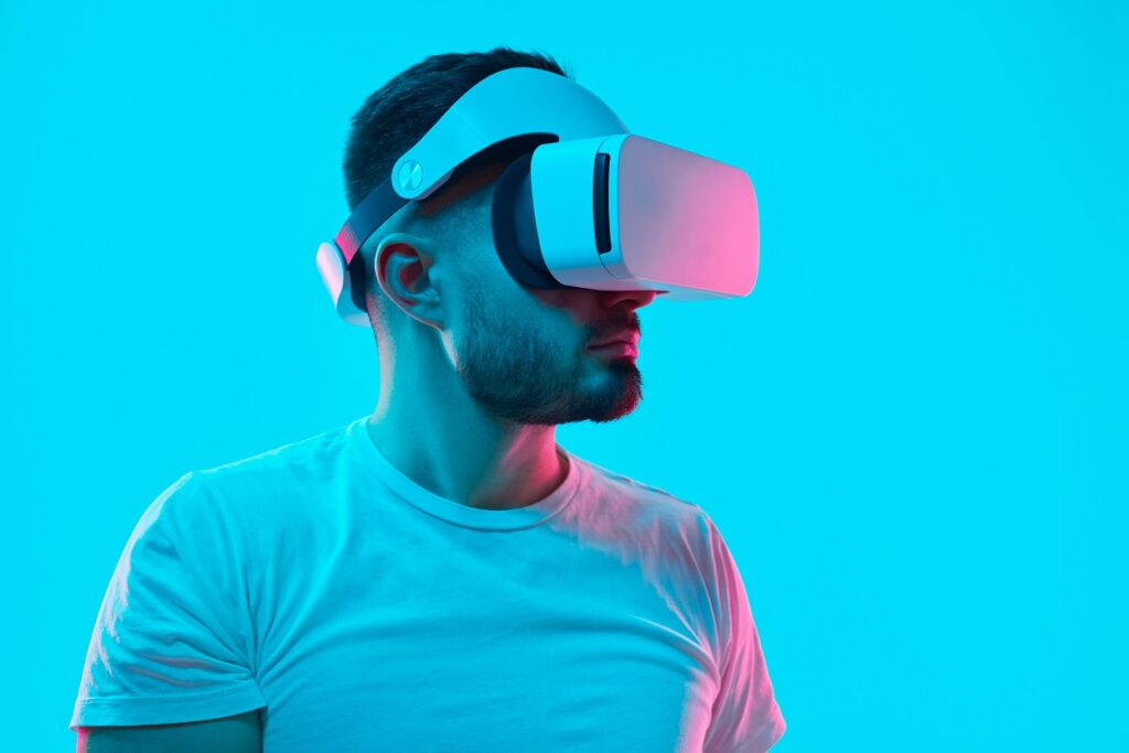 Serious man vr glasses studio with neon lights 1