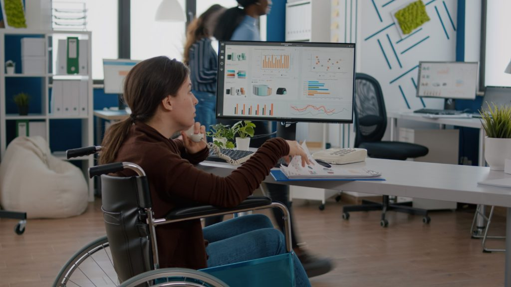 wheelchair user at computer